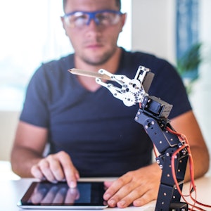 Placeholder for Robot prototype met medewerker