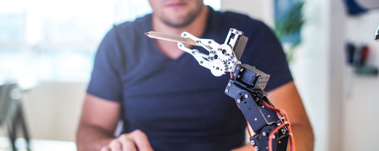 Placeholder for Robot prototype met medewerker