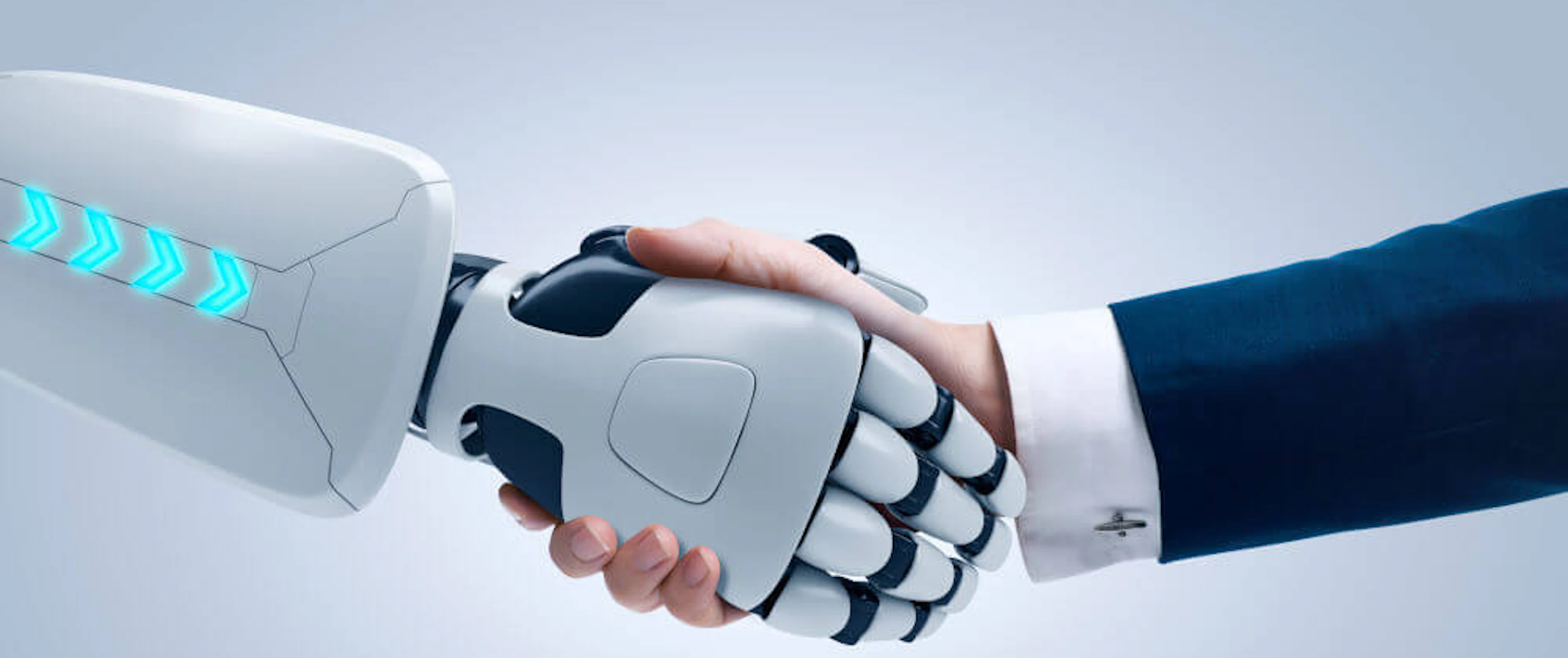 Robotarm schudt hand van man