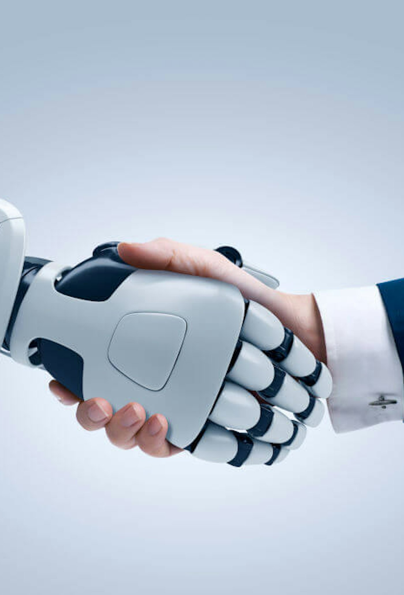 Robotarm schudt hand van man